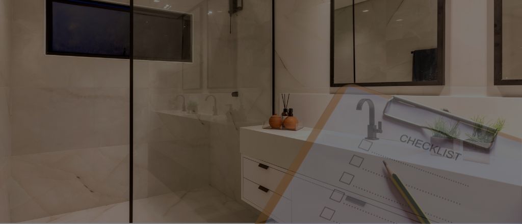 Modern bathroom background overlaid with a clipboard checklist and pen, symbolising early planning and preparation for a bathroom renovation.