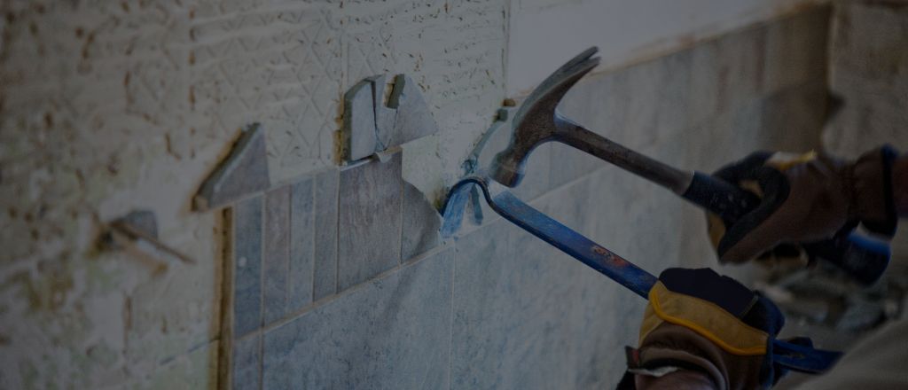 Removing wall tiles during a bathroom renovation project